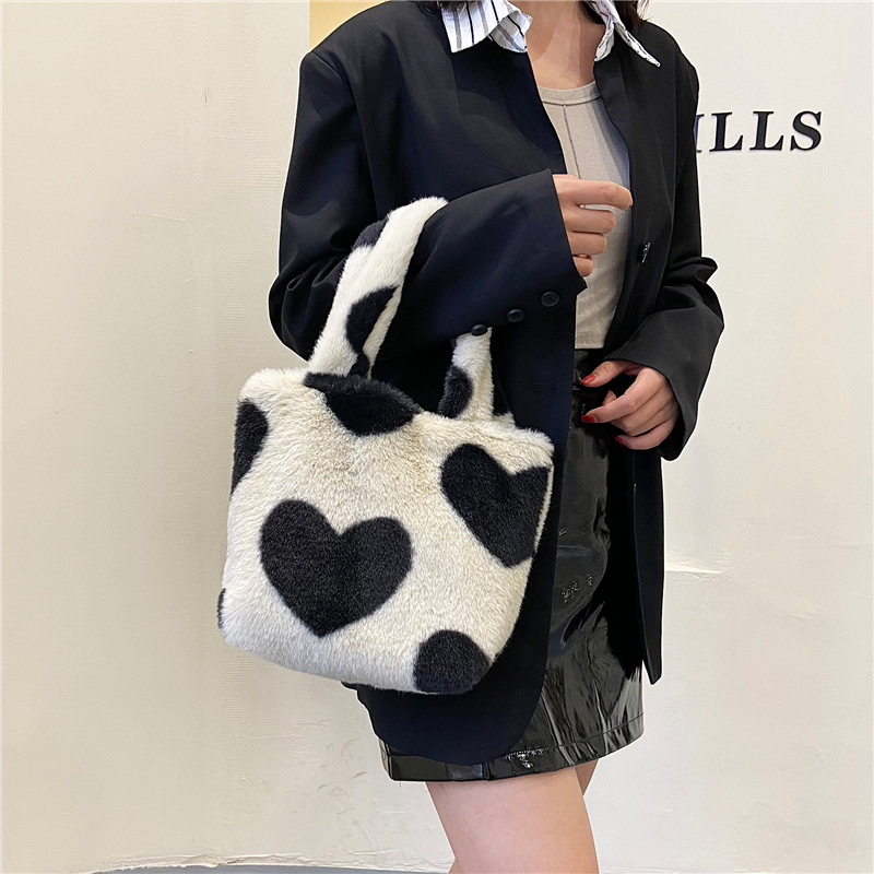 单肩毛绒包包女小众设计甜酷冬季毛毛手提斜挎包百搭手提水桶包