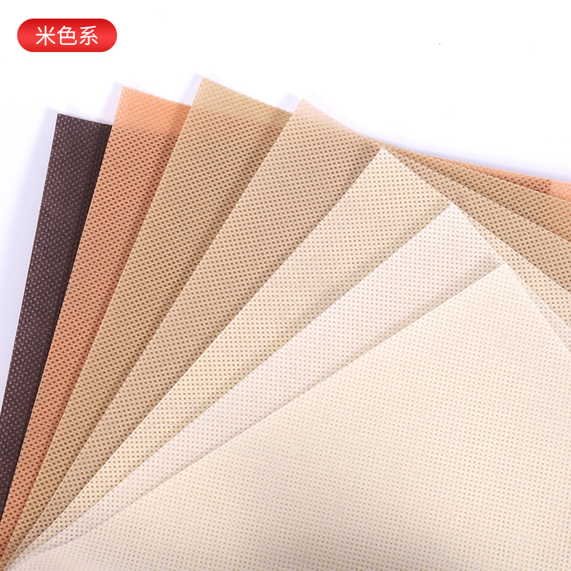 Punto del fabricante de tela no tejida hilada PP SSS polipropileno retardante de llama impresión recubierta ecológica rollo de tela no tejida colorida