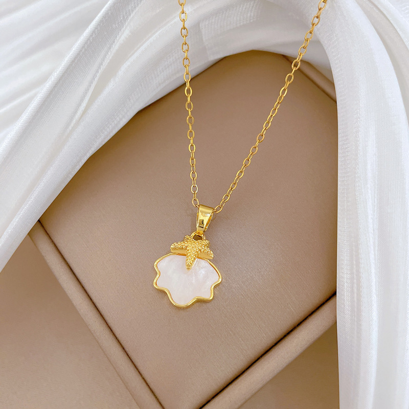 Colar de concha estrela do mar em aço titânio para mulher_voghion.com