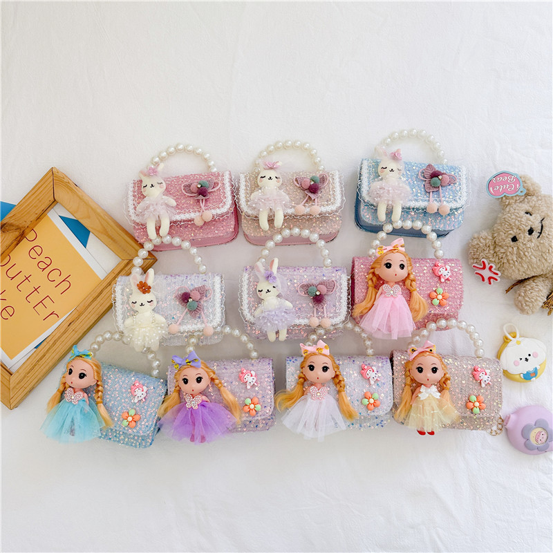 Nuevos niños estilo Chanel estilo bolsa moda perla bolso de hombro de dibujos animados muñeca bolsa de mensajero cadena