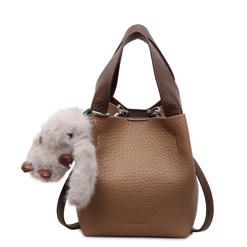 Bolso coreano con estampado de litchi para mujeres 2025 nuevo bolso de cubo de alta calidad de moda versátil bolso de hombro