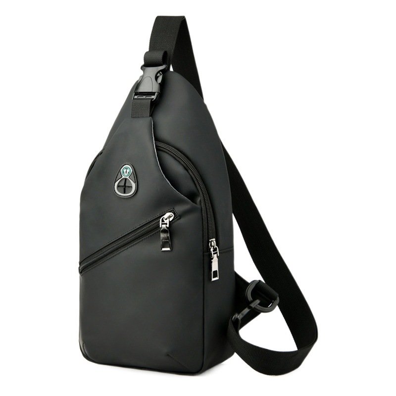 Bolso de hombro para hombre de cuero cuidadosamente seleccionado, moderno bolso de pecho, bolso cruzado con carga USB, versátil mochila deportiva para uso transfronterizo.