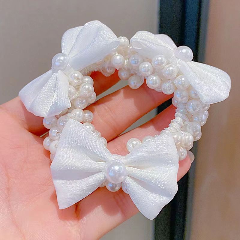 White gauze bow and pearl hair tie