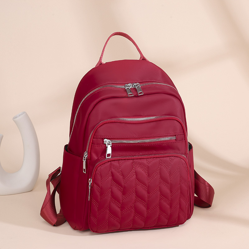 2025 nueva mochila de nylon impermeable transfronteriza mochila de damas de transporte urbano de gran capacidad de moda mochila de estudiantes