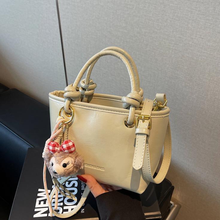 Este año popular bolso de cubo de mano caliente 2025 nuevo bolso de mujer bolso de hombro casual versátil bolso de alta calidad