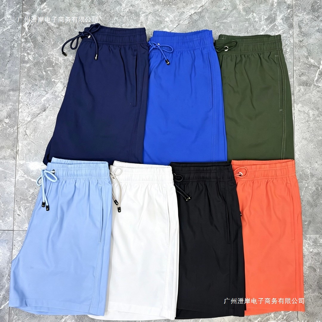 Solid color, water-resistant, quick-drying, stretchy, versatile European and American style surfing beach shorts men's home wear, original stock available.