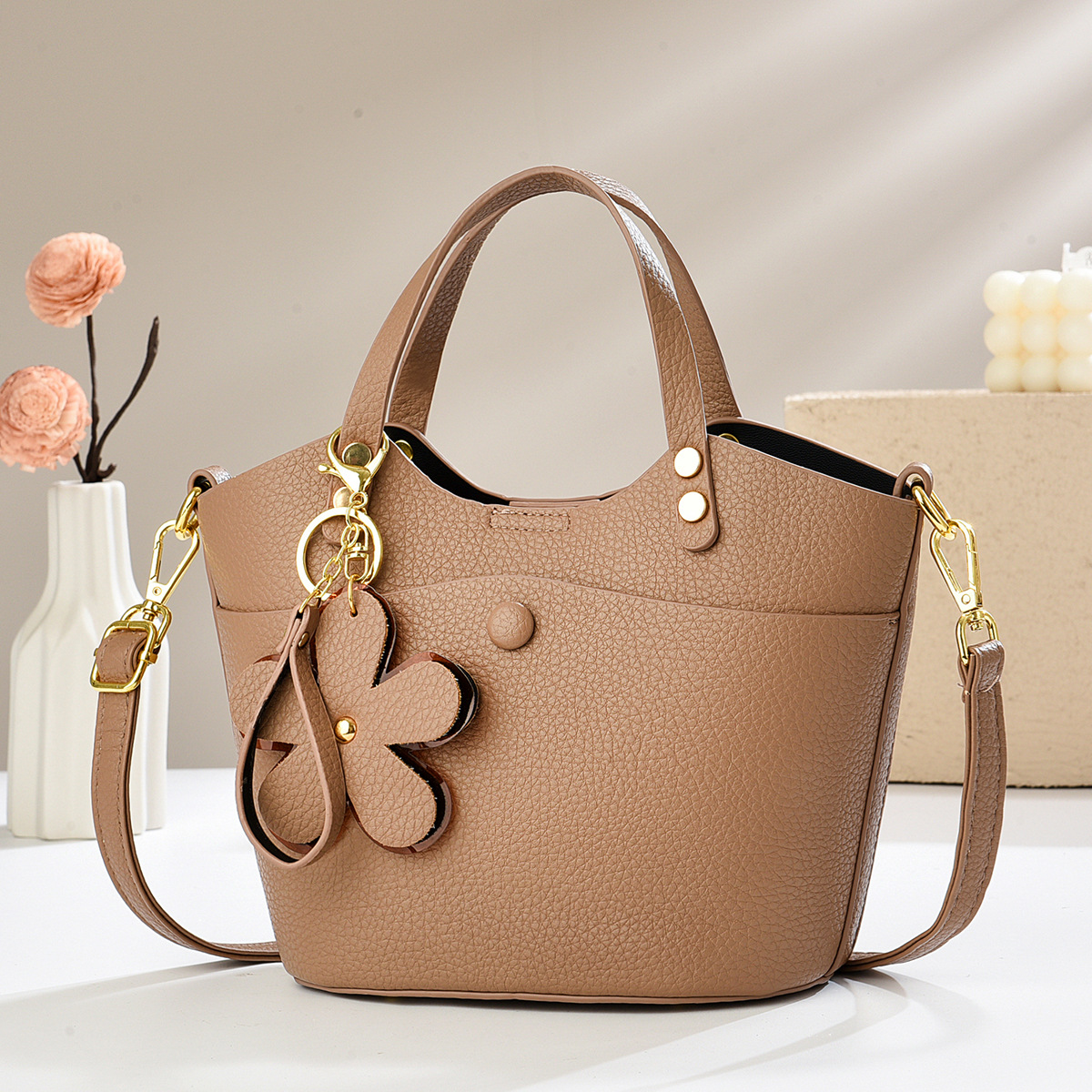 Exquisita bolsa de balde de verano 2025 nueva bolsa de hombro versátil textura mochila bolsos casuales bolsos transfronterizos