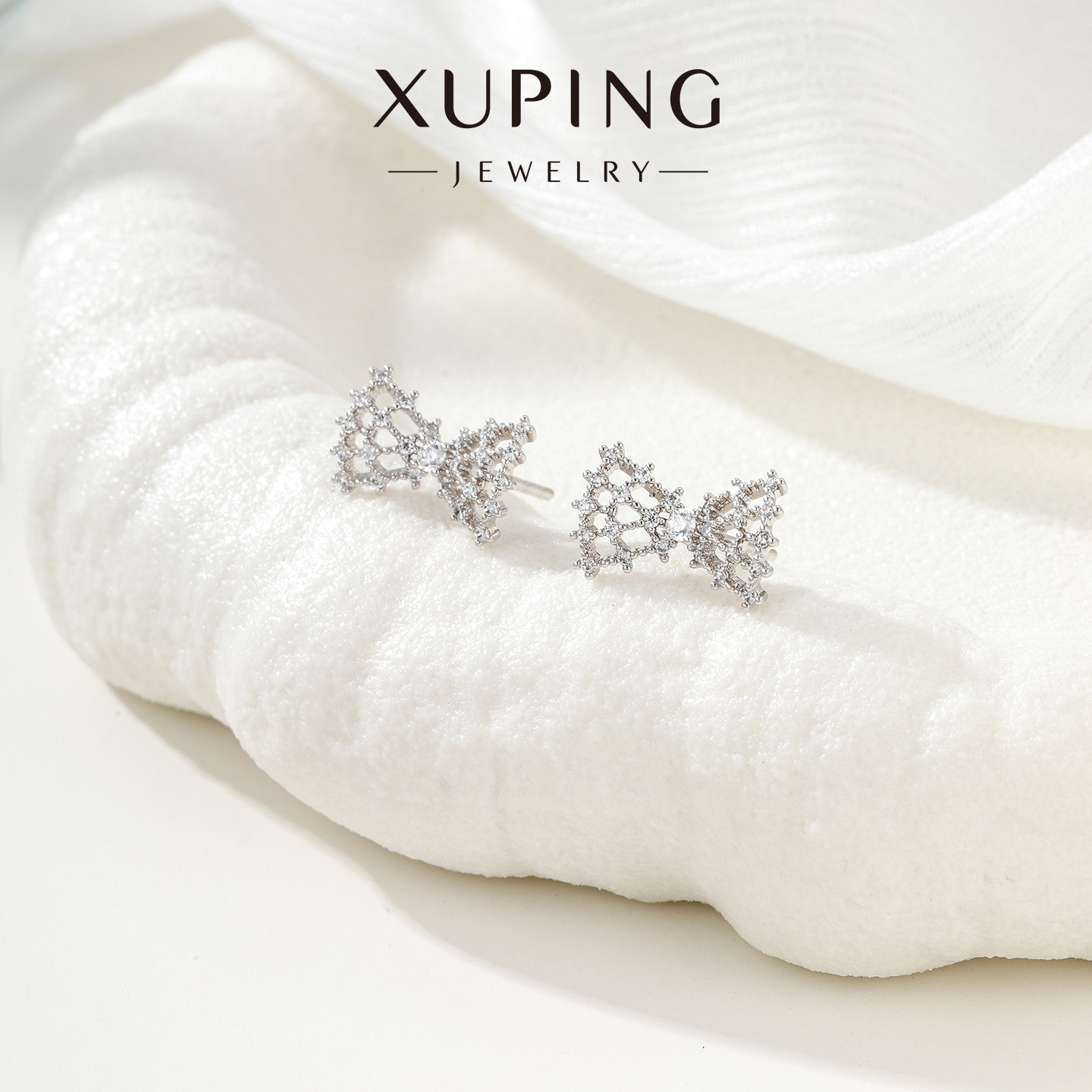 Joyas Xuping flores amor estrellas gotas de agua zircon orejetas de aleación de diamante femenina sensación de diseño de moda ligera orejetas de lujo