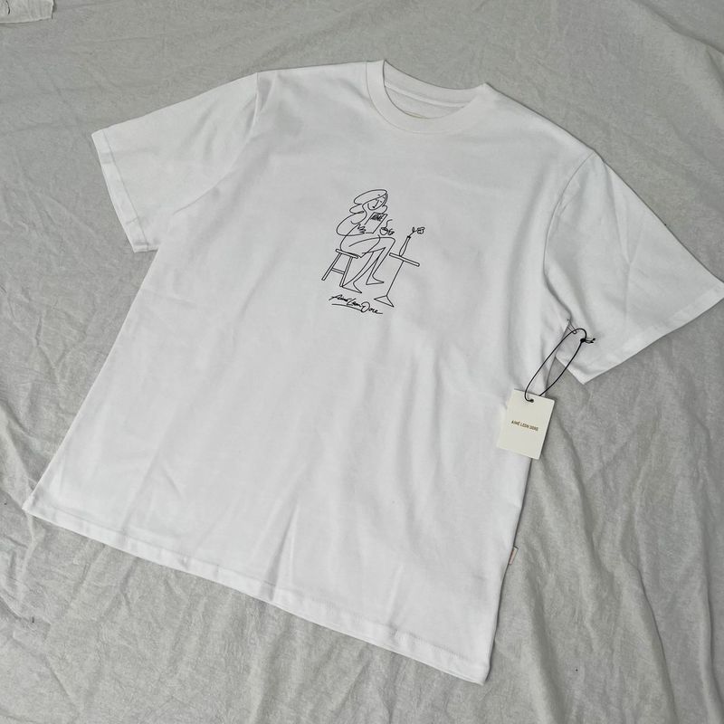 国境を越えた貿易 Aime クラシックレタープリントランドマークビルラウンドネックルーズ半袖 T シャツ男性と女性のカップル用トレンディ|undefined