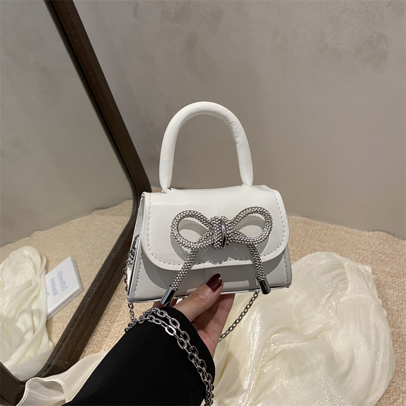 Ins nicho bolso de textura francesa mujer 2025 primavera nuevo arco bolso pequeño bolso de hombro de estilo occidental