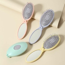 新品气垫梳便携出门旅游折叠两用镜梳按摩头皮可爱美小梳子辉运