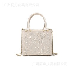 z2025珍珠绣花时尚手提包丝缎质感硬质包轻奢花卉刺绣辣条单肩包