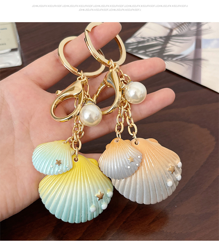 Cute Modern Style Alloy Resin Shell Women's Bag Pendant Keychain display picture 4