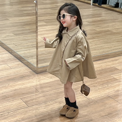 Korean children's spring 2024 dress for girls with a relaxed hem, slanted lapel, and a medium-length, khaki-style coat.