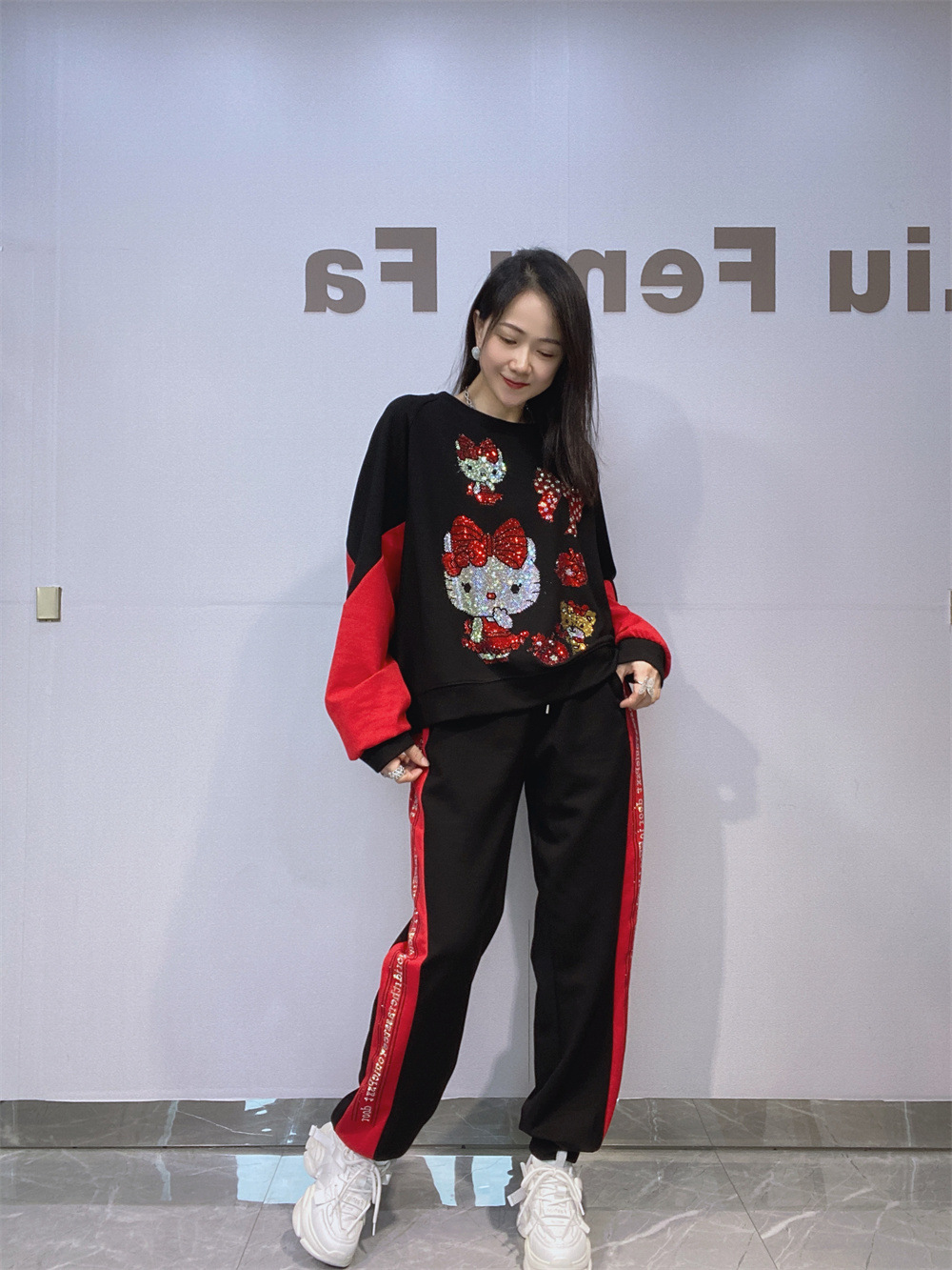 Europa y Estados Unidos de otoño nuevo cuello redondo pantalones de manga larga set de mujeres pantalones largos casuales sueltos ropa deportiva dos piezas set