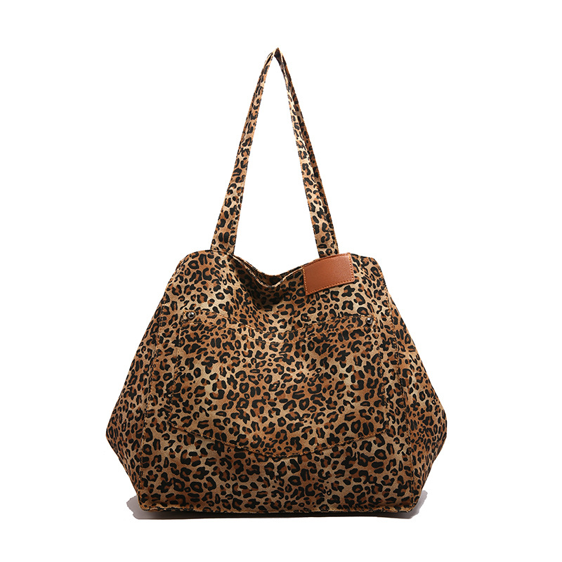 Bolso de mano de lona con estampado de leopardo de nicho Bolso de mujer Bolso de mano de moda de gran capacidad casual Bolso bandolera de estilo occidental coreano