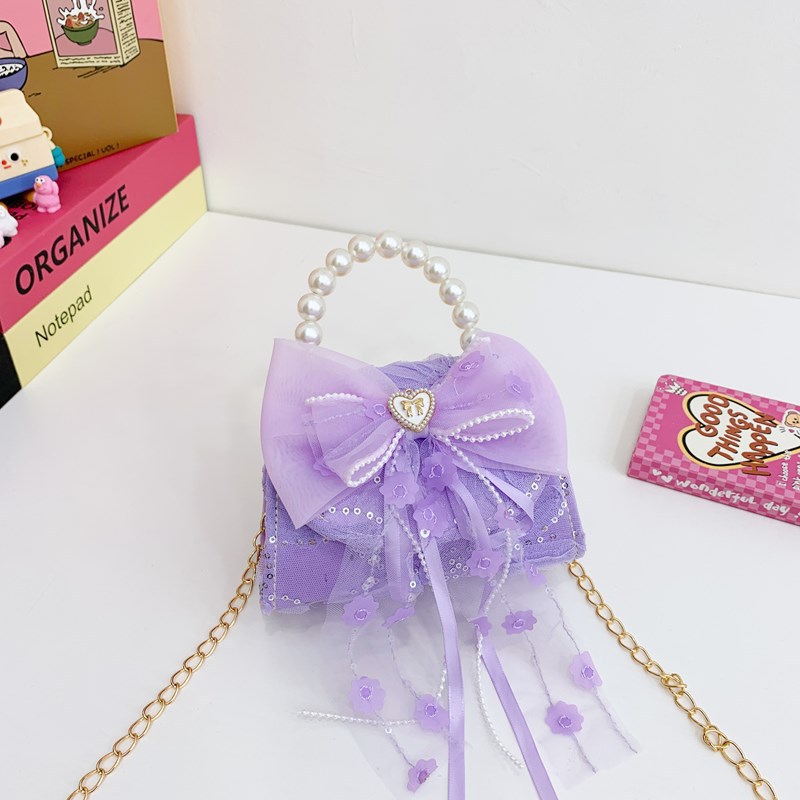 Nuevo bolso de moda para niños bolso de perla animado lindo arco de botón bolso de hombro de niñas cadena diagonal bolso pequeño