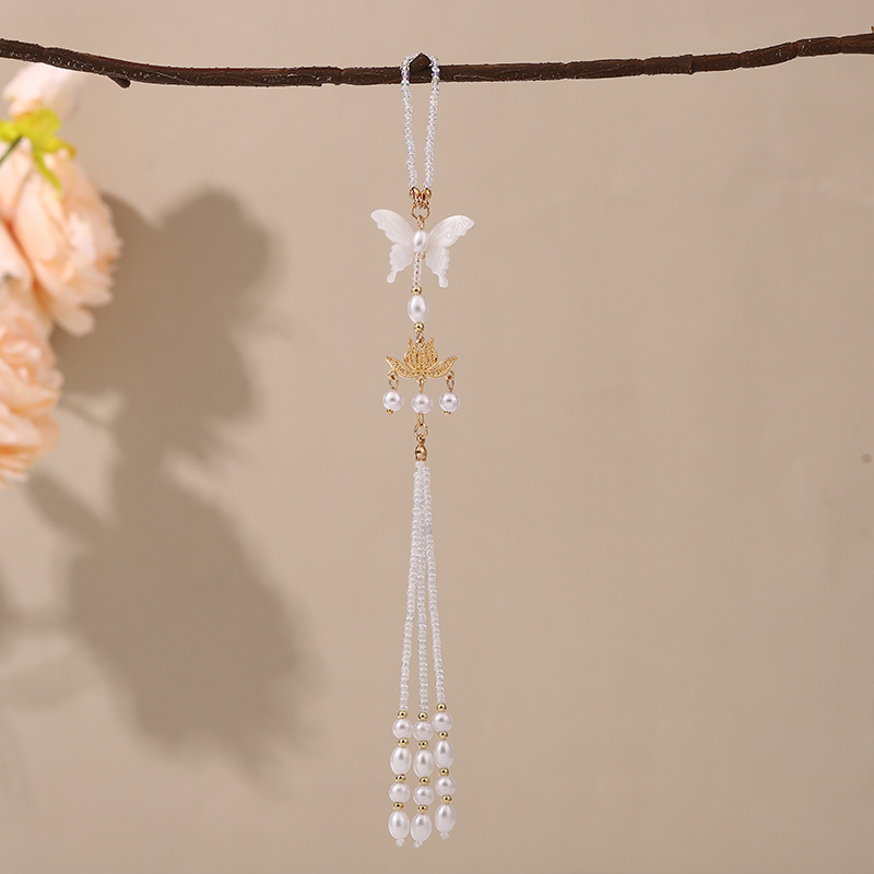 Nuevo estilo chino cheongsam colgante de tapeta de presión femenino de alta gama borla estilo chino Magnolia Ruyi Palace Hanfu Accesorios