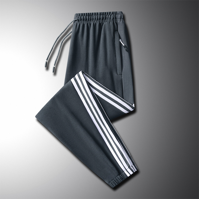 2024 primavera y otoño nuevo estilo brocado algodón roma pantalones de guardia de pies casuales sueltos coreanos pantalones de tres barras al por mayor