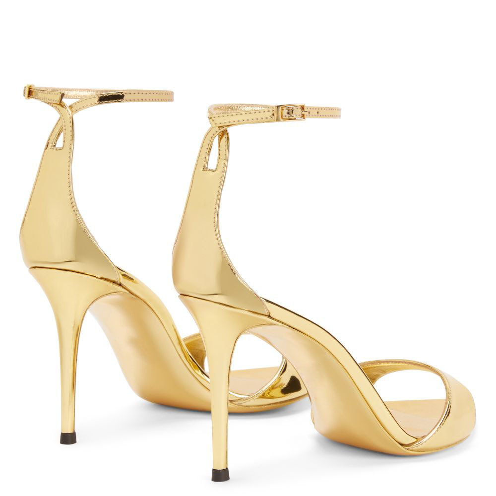 gold Stilleto heels