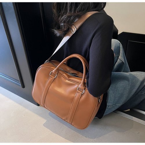 A Korean high-end, niche underarm bag for women, 2025 spring and summer fashion, retro, single-shoulder, versatile, hand-held.
