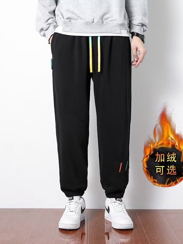Primavera y otoño 2024 nuevos pantalones casuales para hombres, pantalones deportivos sueltos de la marca de moda juvenil, pantalones deportivos sueltos de color sólido
