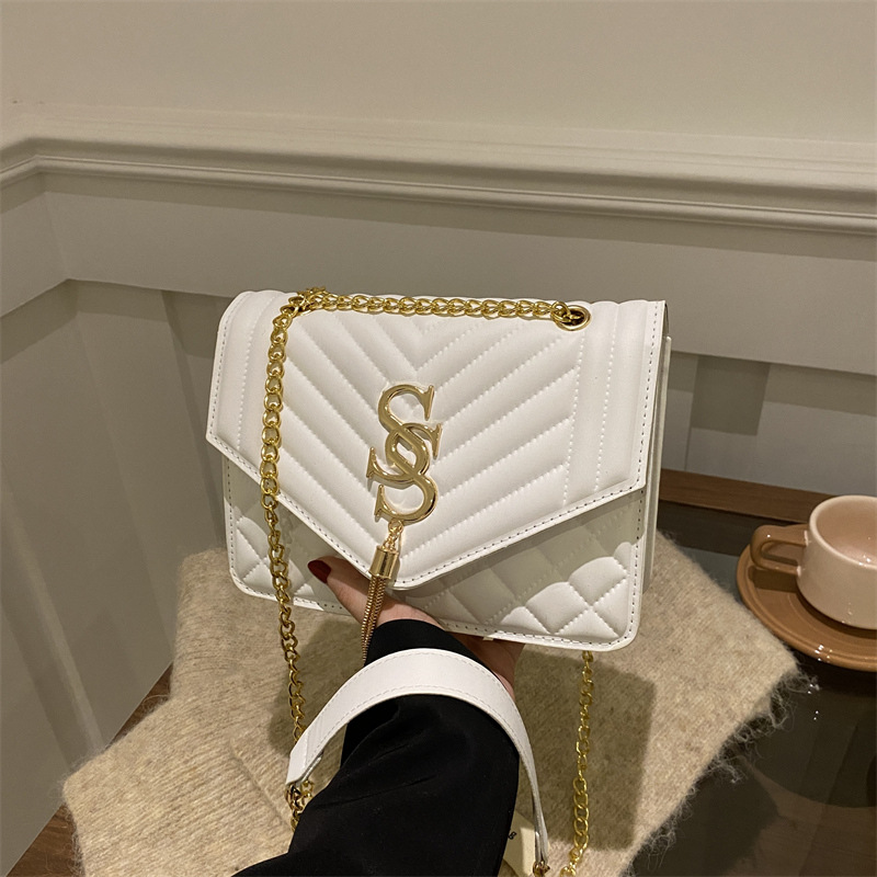 Cadena de hendidura de diamante bolso de hombro para mujeres 2025 primavera y verano nueva moda simple tendencia brazo bolso