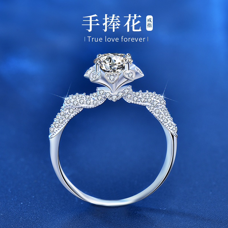 Original hand holding flower moissanite...