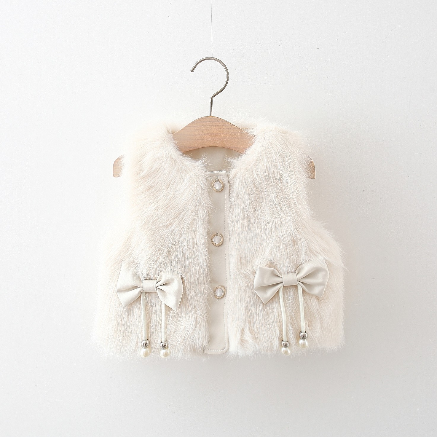 Invierno nuevo estilo dos bowknot piel suéter chaleco niñas versión coreana lindo chaleco de piel comercio exterior 1732