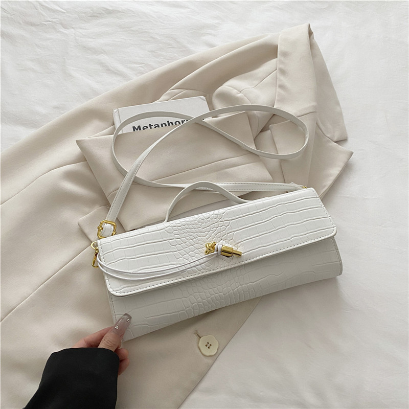 2025 verano temperamento tendencia nuevo temperamento bolso de palo francés con bloqueo diagonal bolso horizontal bolso de mensajero de un solo hombro bolso femenino