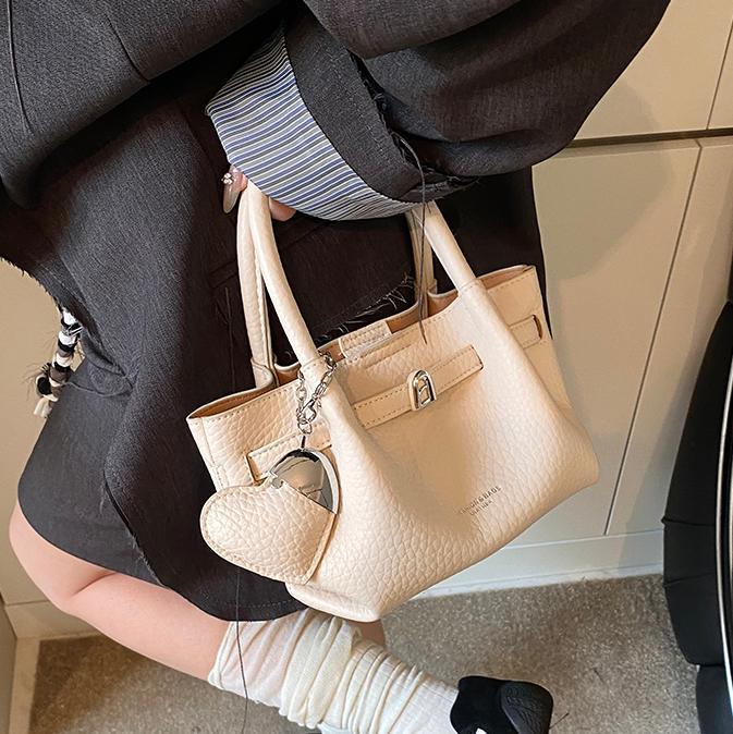 Tendencia versátil bolso de mano para mujeres 2025 nuevo estilo simple textura de transporte de tren mochila de alta calidad bolso de brazo de moda