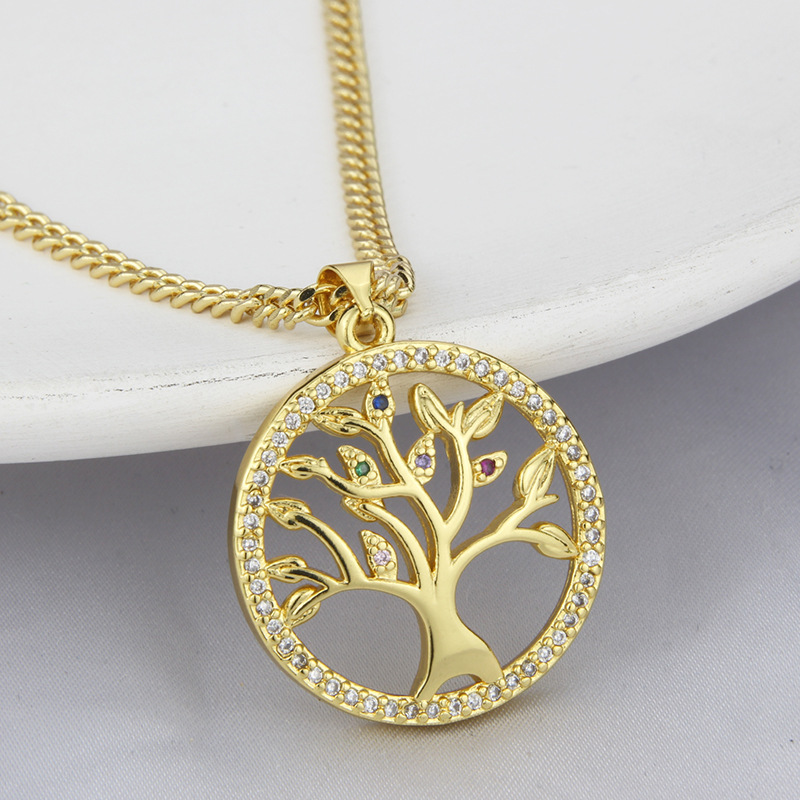 New Gold-plated Copper Zircon Tree Of Life Necklace Hollow Tree-shaped Round Pendant display picture 2