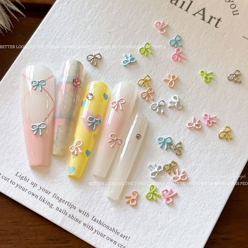Mini bow alloy nail ornaments exquisite vitality cream hollow bow tie nails cross-border decorations wholesale