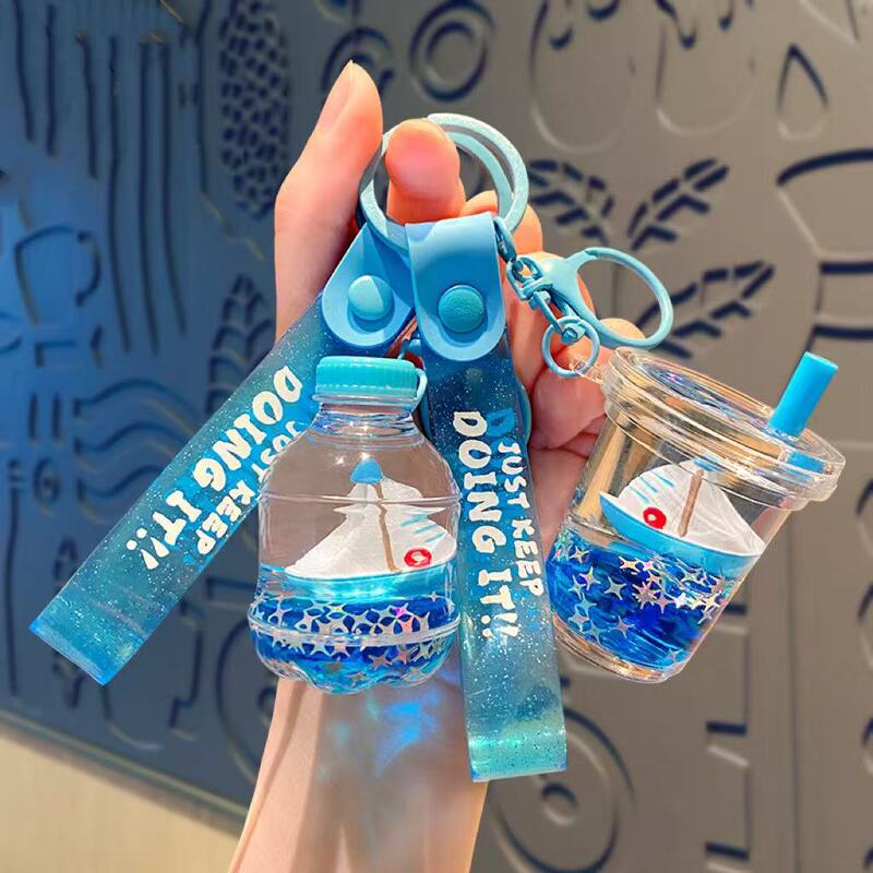 Sailing Milk Tea Cup into Oil Quicksand Bottle Acrylic Keychain School Bag Pendant Wholesale Graduation Season Gift Small Accessories