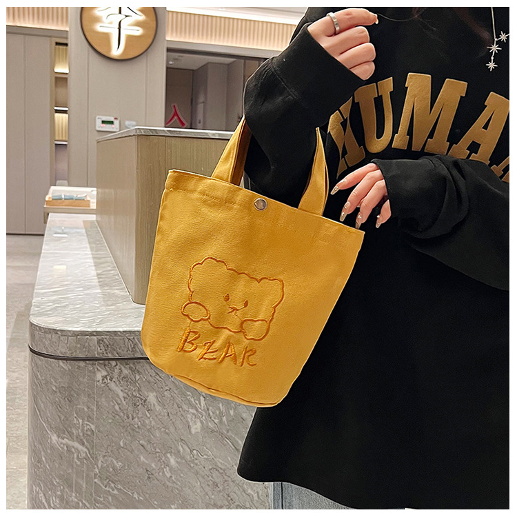 Personalized ladies' bucket bag, versatile and cute canvas bear wholesale, simple Japanese style new handbag undefined
