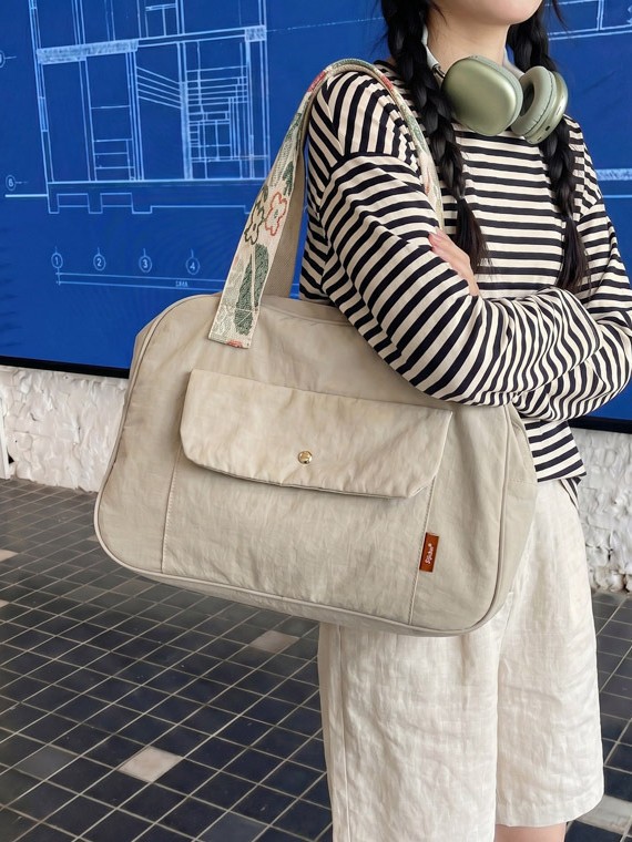 Bolso de mano de gran capacidad para mujeres 2026 bolso de brazo ligero simple de hombro para viajar bolso de viaje