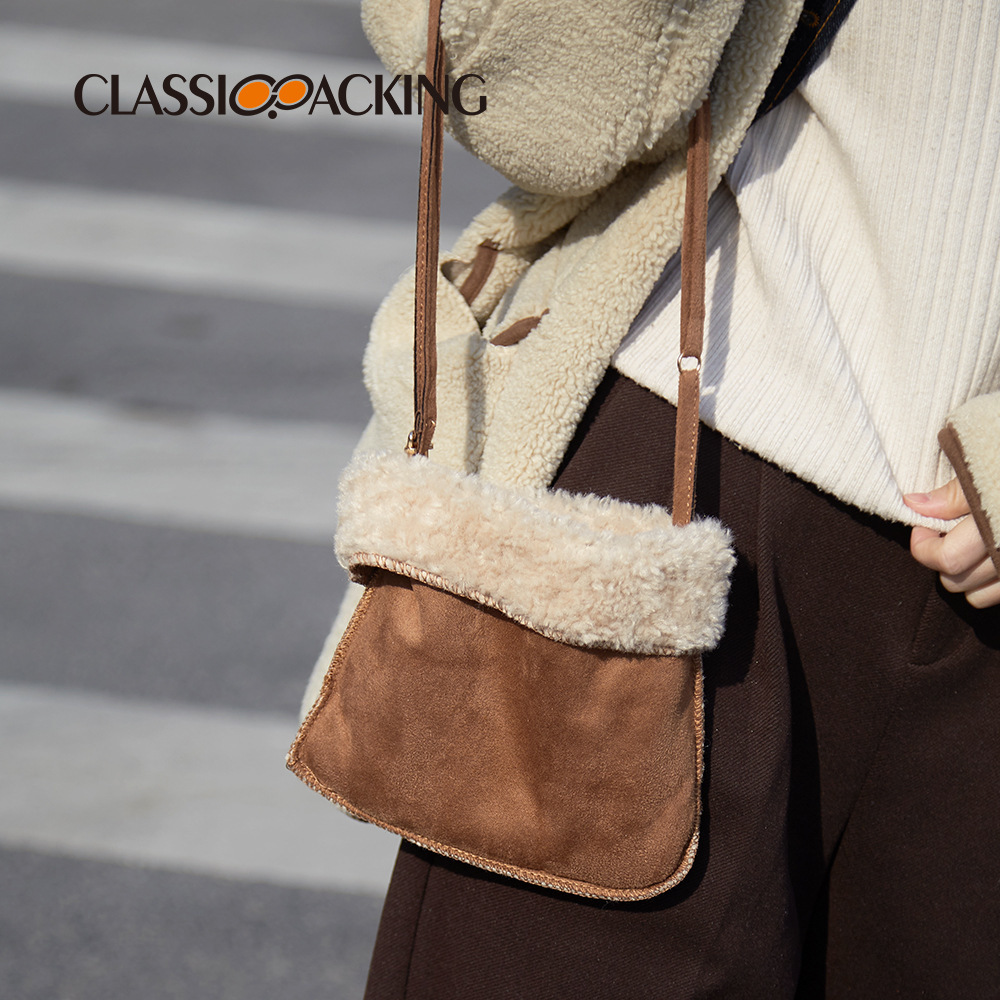 2025 versión coreana de la bolsa de teléfono móvil de color sólido simple empalme material de lana de cordero bolso de mensajero de un solo hombro bolso de lana de otoño e invierno