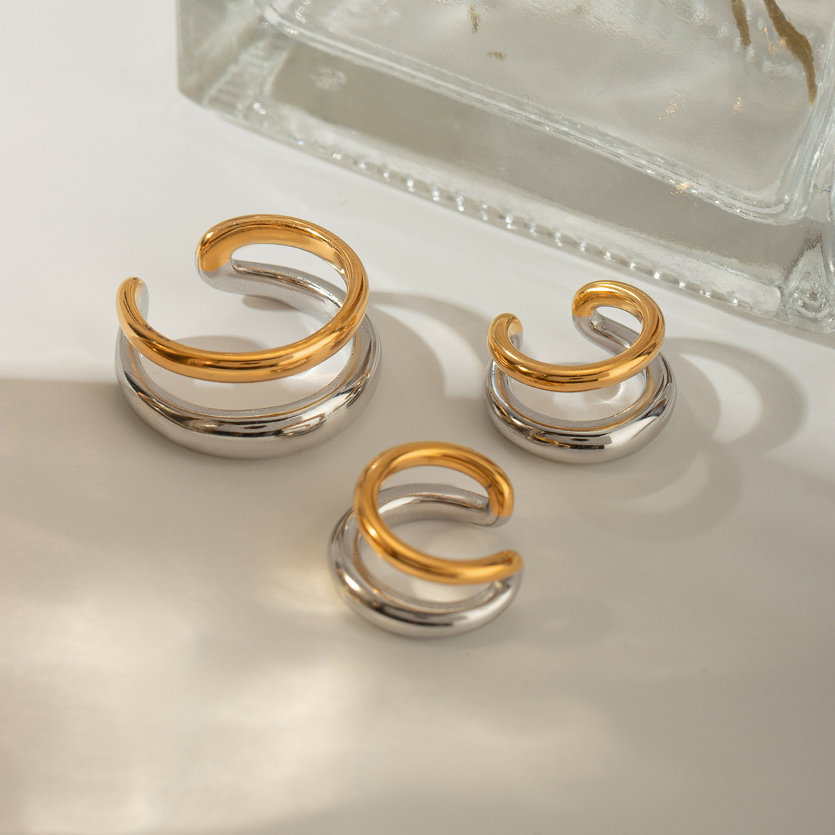 Europa y los Estados Unidos transfronterizos en el estilo de moda simple 18k oro acero inoxidable color de doble capa un par de joyas de orejas