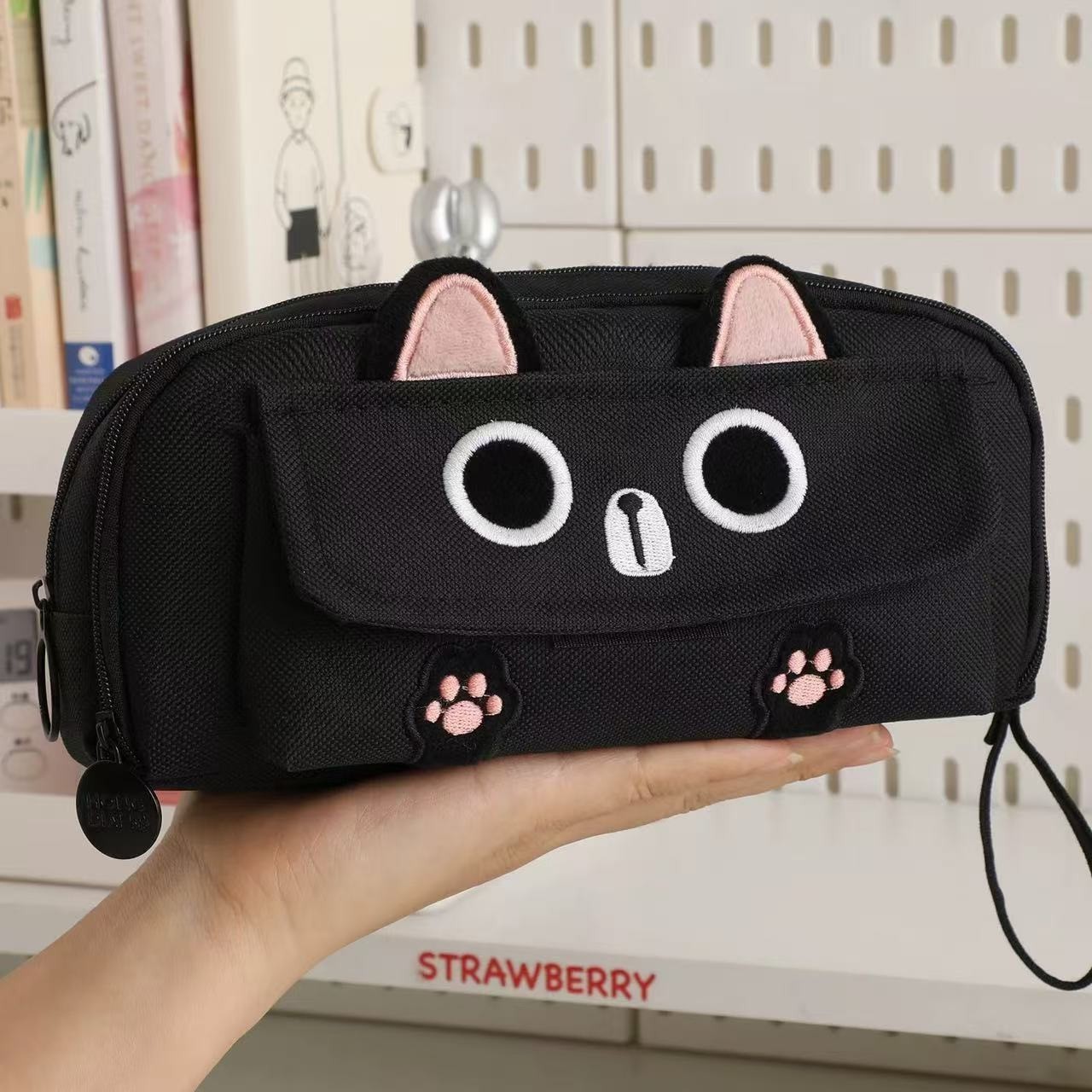 Bordado negro aturdido gato volcado bolsa de pluma