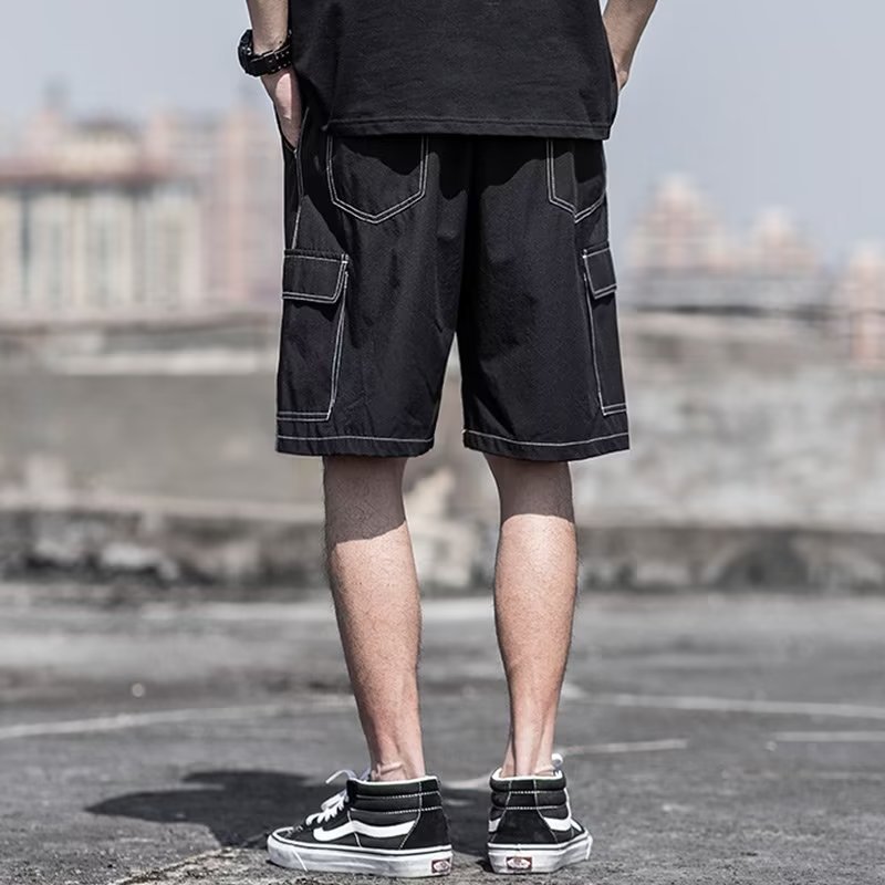 Pantalones cortos estadounidenses de cinco puntos de marca de moda para hombres de verano al por mayor pantalones finos de seda de hielo deportivos sueltos de gran tamaño súper transpirables