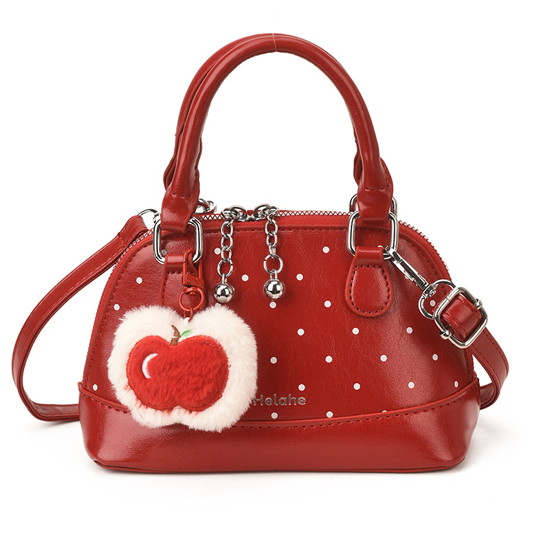 Bolsas coreanas para niños y niñas, bolsas de conchas, bolsas de mano de manzana, bolsas para niños, bolsas de comercio exterior transfronterizas 2026