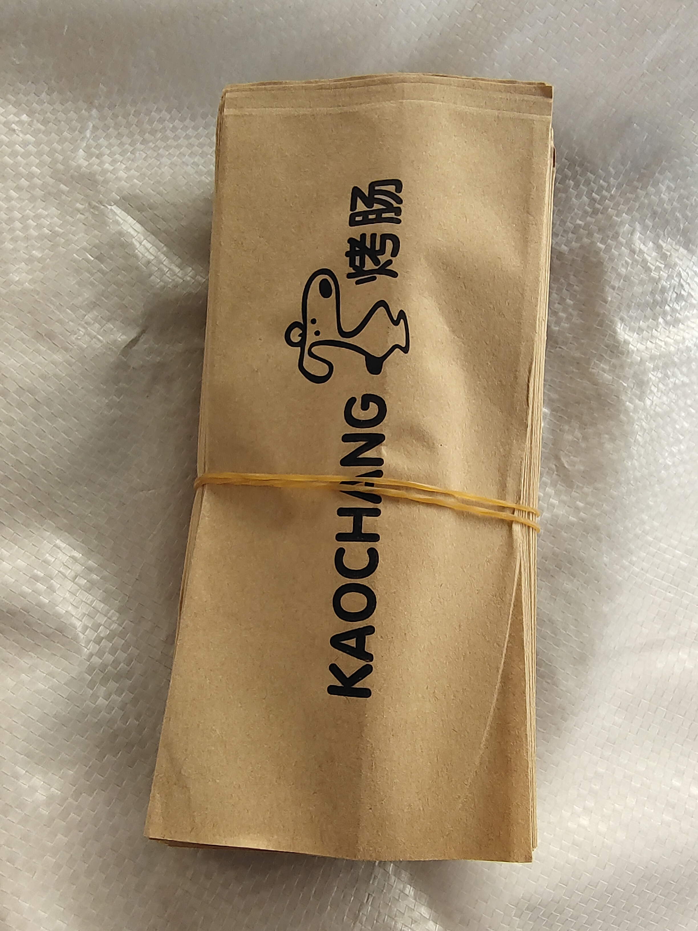 Bolsa de salchicha asada, almidón volcánico, bolsa de salchicha asada crujiente, pastel de arroz, jamón, perros calientes, bolsa de embalaje, papel kraft a prueba de aceite, fijación