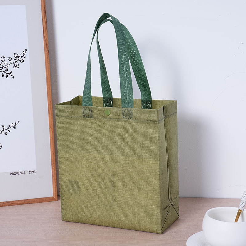 Bolsa de mano no tejida con botón tienda de ropa tienda de gafas bolsas de té bolsas de regalo de compras personalizadas LOGO impreso
