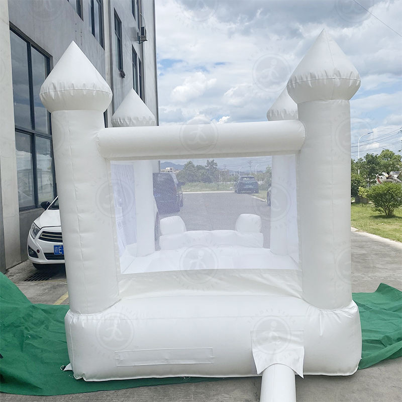 White children inflatable slide trampoline celebration wedding…