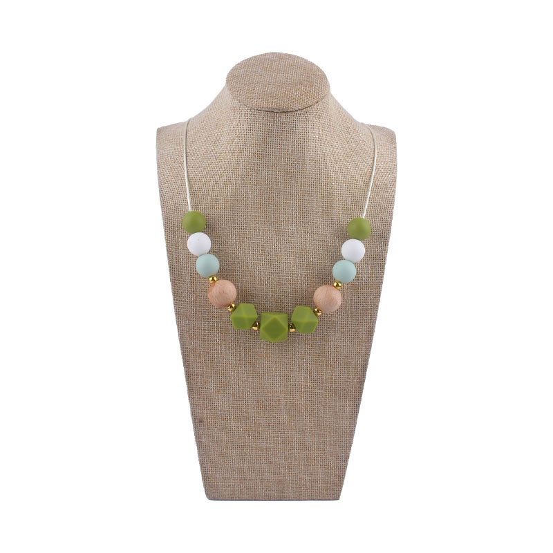 Los nuevos bebés de contraste de color de silicona octogonal mordedor collar de los bebés mordedor palo masticable colgante collar