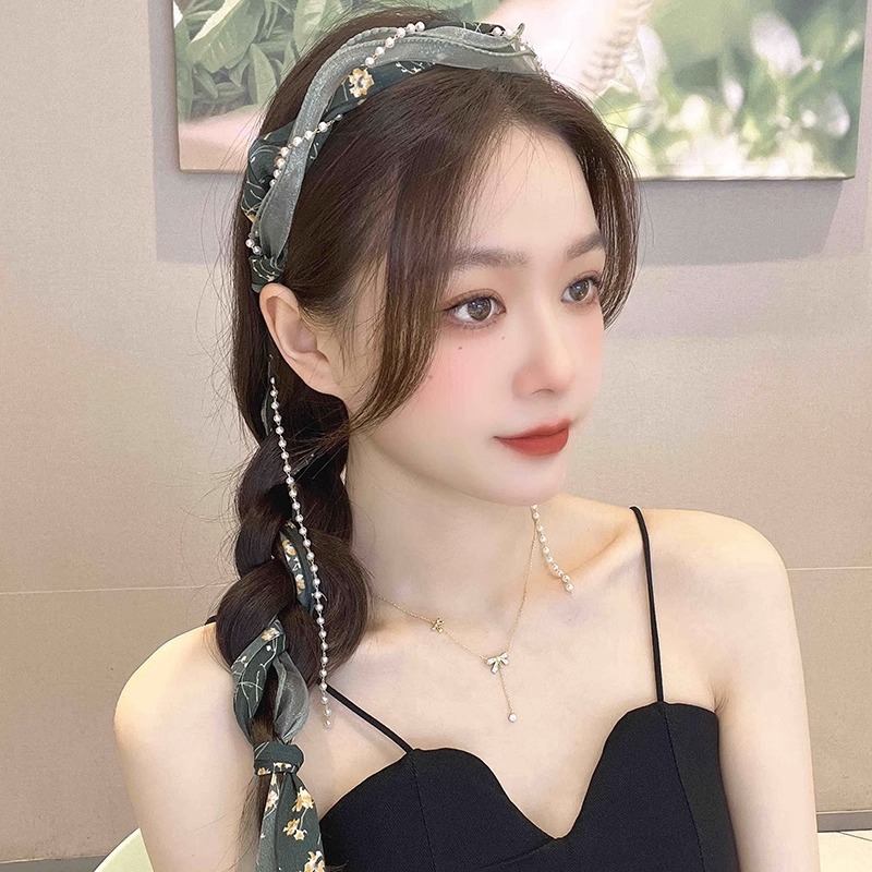 1 # Diadema de borla verde retro.