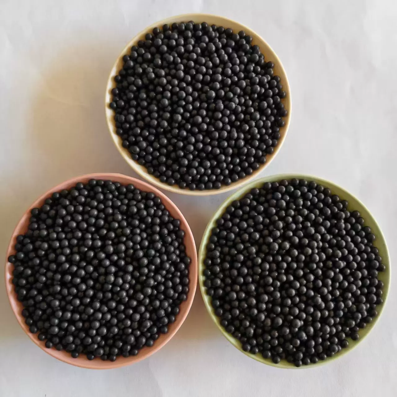 批发麦饭石球毛绒玩具坐垫床垫填充配重用的托马琳负离子能量球