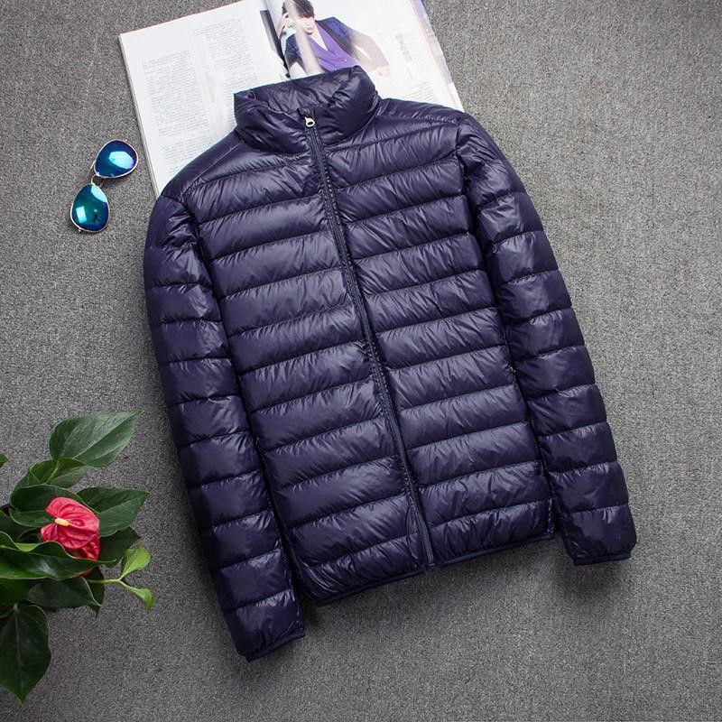 Chaqueta de algodón de plumas ligera y delgada para hombre otoño e invierno 2023 Chaqueta de algodón de gran tamaño con capucha ligera y anti-temporada marca