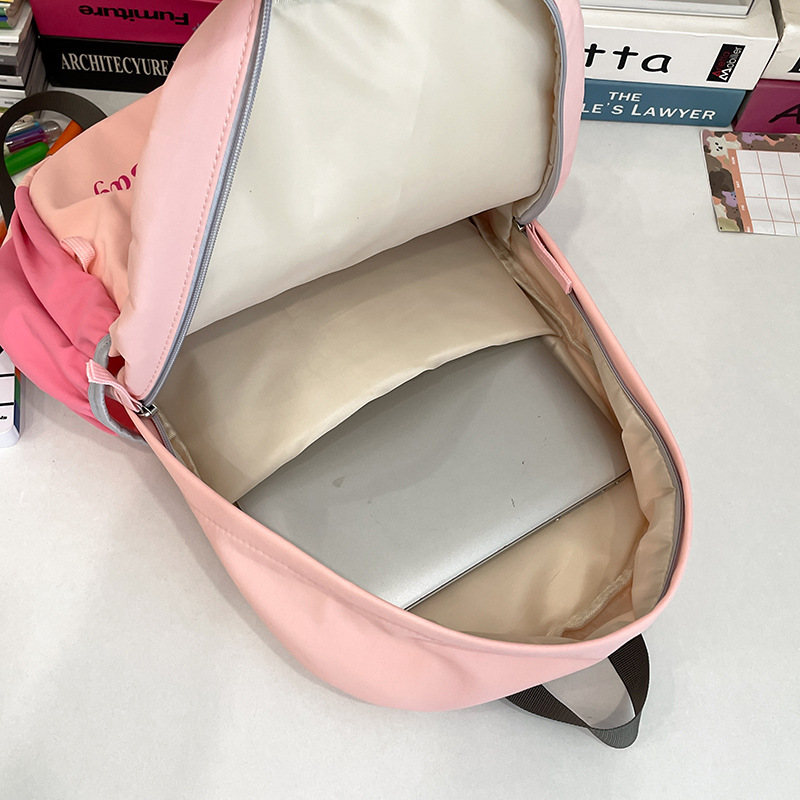 2024 nueva mochila de nailon para mujer, ocio, viaje al aire libre japonés, mochila escolar de gran capacidad para estudiantes de secundaria, mochila al por mayor