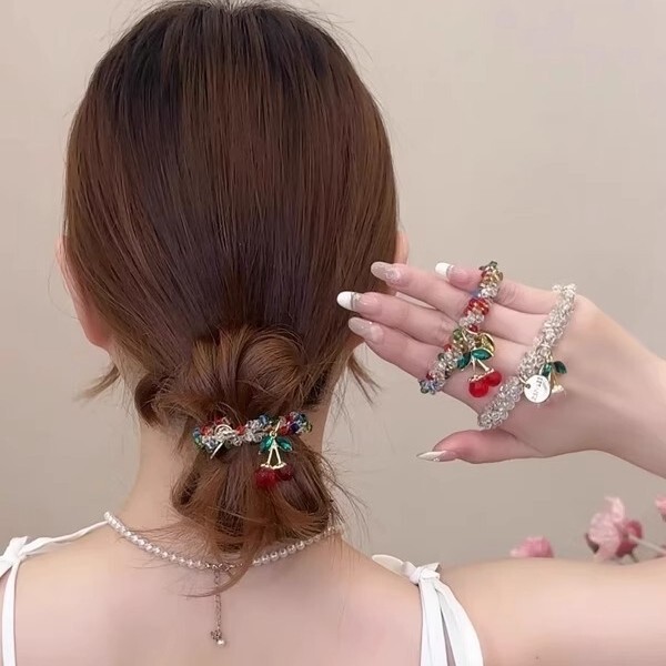 髪の輪のひもの女性韓国の高級感の卸売りの高弾力の新型のさくらんぼのブレスレットの両用の水ドリルの皮の筋|undefined